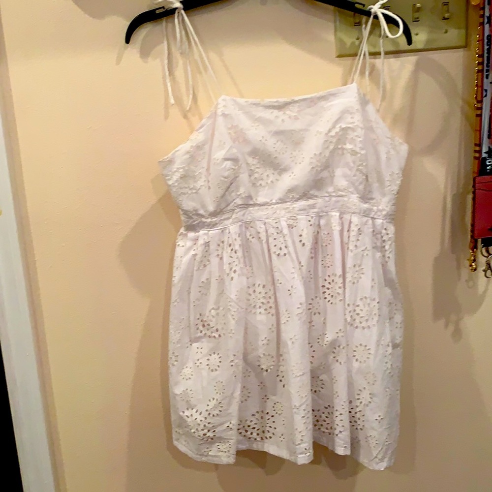 a mini white lacey dress